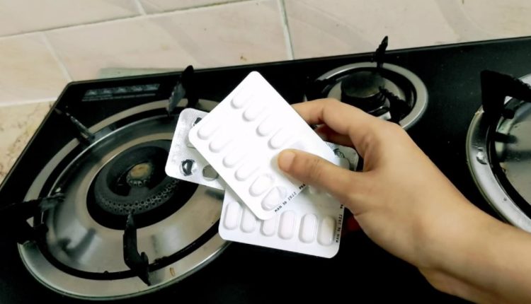 Gas Stove Cleaning Tip Using Tablet Cover